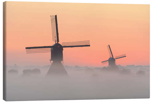 Lerretsbilde Windmills on a misty morning