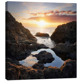 Canvas print Sunrise on the rocky coast