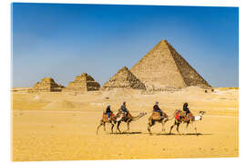 Acrylic print Camel riders in front of the pyramids of Giza