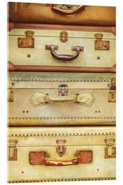 Acrylglas print Stack of ancient travel suitcases