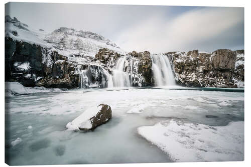 Canvas-taulu Waterfall in winter, Iceland