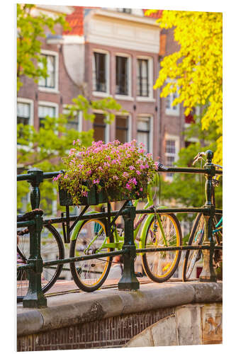 PVC-tavla Bicycles on a sunny canal bridge in Amsterdam