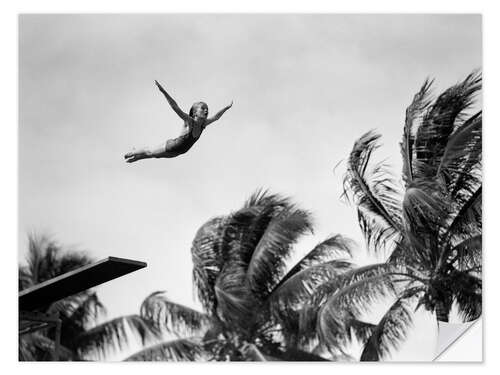 Selvklebende plakat Young girl diving with palm trees