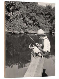 Tableau en bois Jeune pêcheur avec un chien au bord d’un étang, 1930