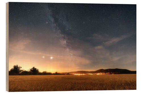 Puutaulu The Milky Way over the Brocken low mountain range in the Harz Mountains