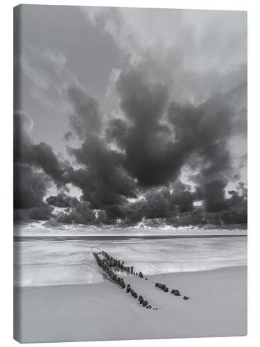 Canvas print Groyne with clouds, black and white