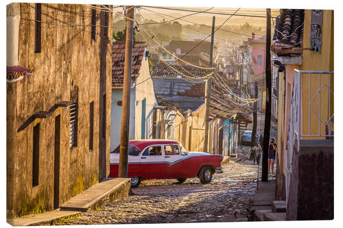 Canvas print Classic car in Trinidad, Cuba at sunset