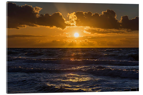 Acrylglasbild Sonnenuntergang über der welligen Ostsee