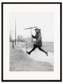 Gerahmter Kunstdruck Sprung über die Pfütze