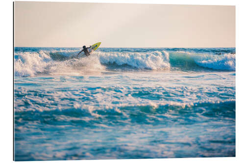 Gallery print Surfing in the ocean at sunset