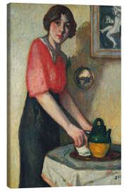 Canvas print Young woman with a green pot