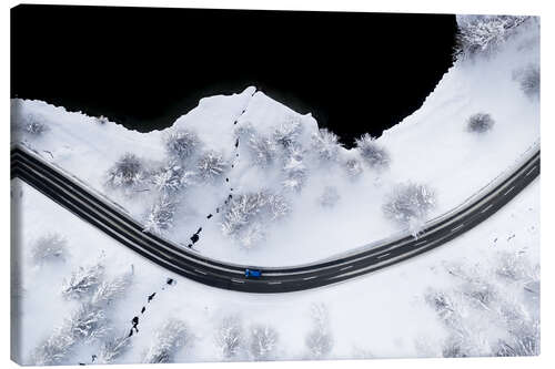 Canvas print Car on the snow-covered mountain road