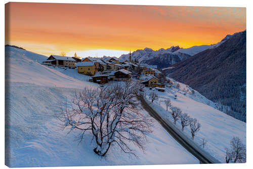 Canvas print Snow-covered mountain village at dawn, Switzerland