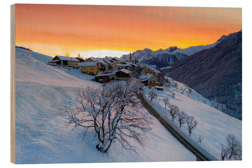 Wood print Snow-covered mountain village at dawn, Switzerland