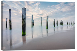 Leinwandbild Pfähle am holländischen Strand