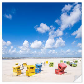 Naklejka na ścianę Colorful beach chairs on the North Sea beach Westbad on Langeoog