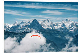 Obraz na aluminium Paraglider pilot in front of the Bernese Alps