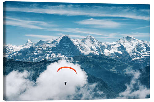 Leinwandbild Gleitschirmpilot vor den Berner Alpen