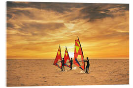 Acrylic print Three surfers in the sunset