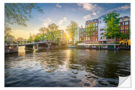 Wall sticker Sunrays over a canal in Amsterdam