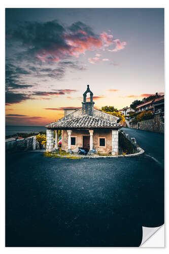 Selvklebende plakat Small church between a street at sunset