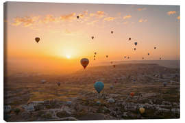 Stampa su tela  Sunrise in Cappadocia full of hot air balloons - Marcel Gross