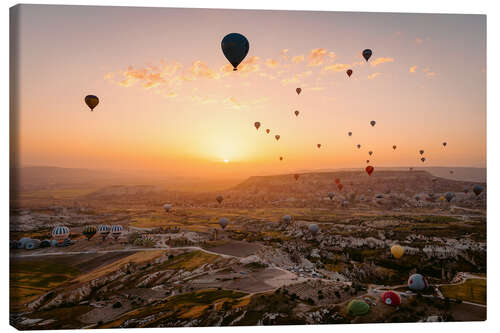 Canvas print Hot air balloon flight over Cappadocia at sunrise