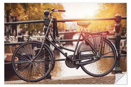 Adesivo murale Old bicycle in Amsterdam at sunset