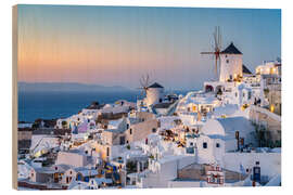 Wood print Sunset in the village of Oia on Santorini