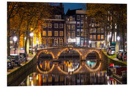 Cuadro de PVC Illuminated bridge at night in Amsterdam, the Netherlands