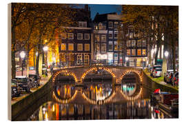 Quadro de madeira Illuminated bridge at night in Amsterdam, the Netherlands