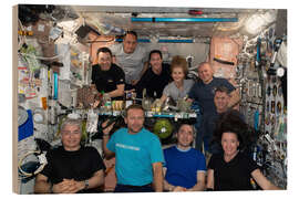 Quadro de madeira Group portrait of astronauts and space tourists on the ISS, Oct. 2021