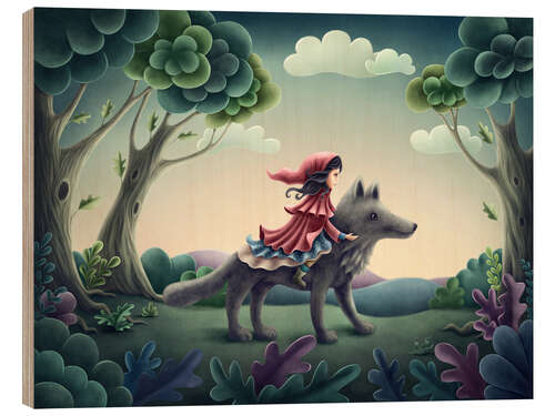 Obraz na drewnie Little red riding hood sits on the wolf