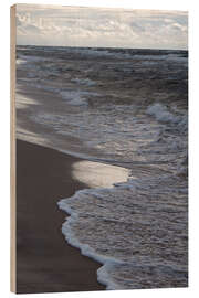 Wood print Clouds, waves and beach on golden evening walk