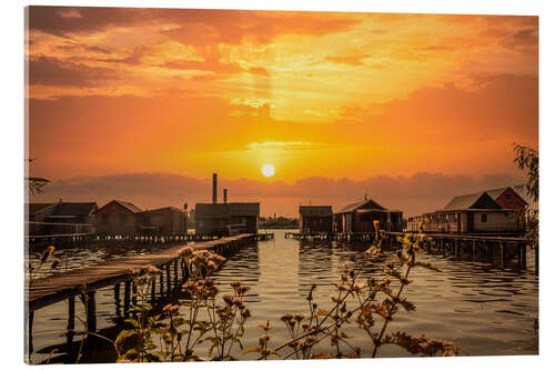 Acrylic print Cottages on the lake with a jetty at sunset