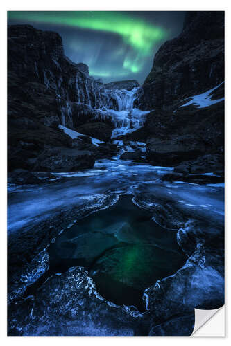 Wall sticker Aurora night over a frozen waterfall in Iceland