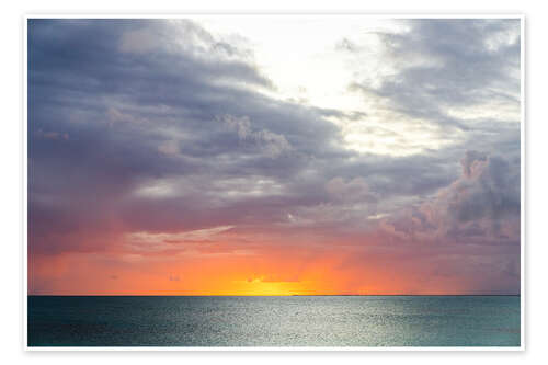 Plakat Clouds in the burning sky at sunset