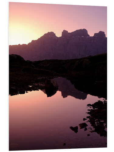 Print på skumplade Mountain silhouette in the evening light in the Swiss Alps