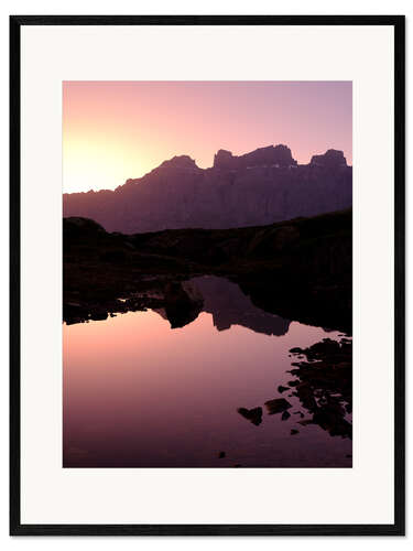 Framed art print Mountain silhouette in the evening light in the Swiss Alps