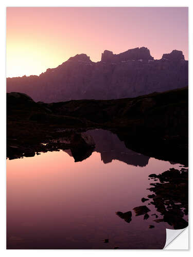 Naklejka na ścianę Mountain silhouette in the evening light in the Swiss Alps