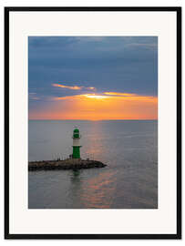 Impression artistique encadrée Mole on the Baltic Sea coast in Warnemünde with sunset