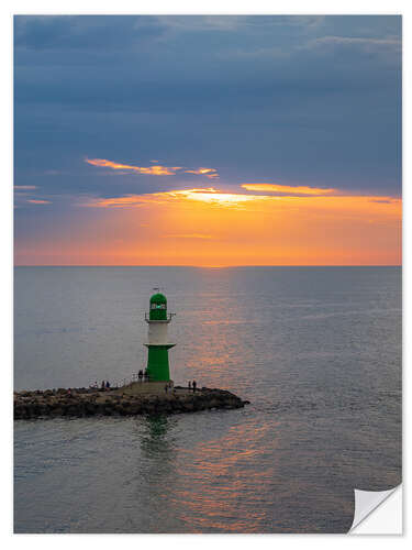 Vinilo para la pared Mole on the Baltic Sea coast in Warnemünde with sunset