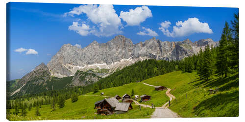 Leinwandbild Ein Amldorf in den Alpen