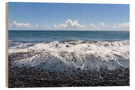 Trätavla Beach with black sand and stones in Tahiti