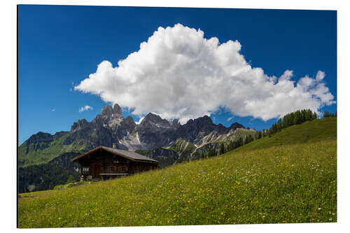 Stampa su alluminio Alpine meadow with mountain hut and cloud formation in summer