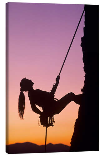 Canvas print Woman Climbing at Sunset Over Salt Lake Valley in the Wasatch Mountains