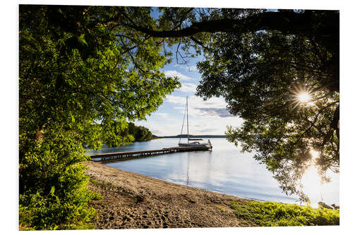 Stampa su PVC Sailboat on a lake at sunset