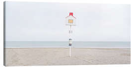 Tableau sur toile Birdhouse on the beach