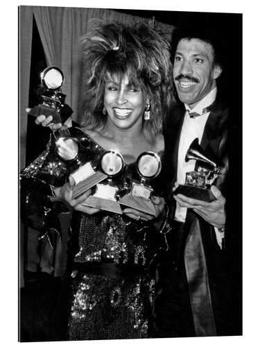 Quadro em plexi-alumínio Tina Turner and Lionel Ritchie at 27th Grammy Awards, 1985