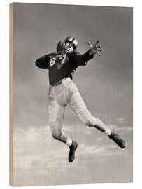 Cuadro de madera Quarterback Throwing a Football